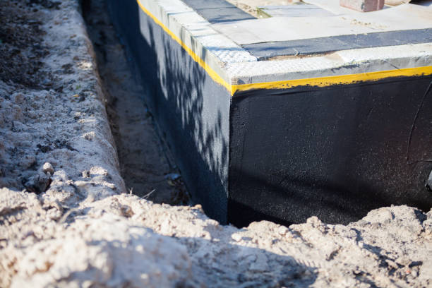 Professional Waterproofing technician working in Hebron, MD